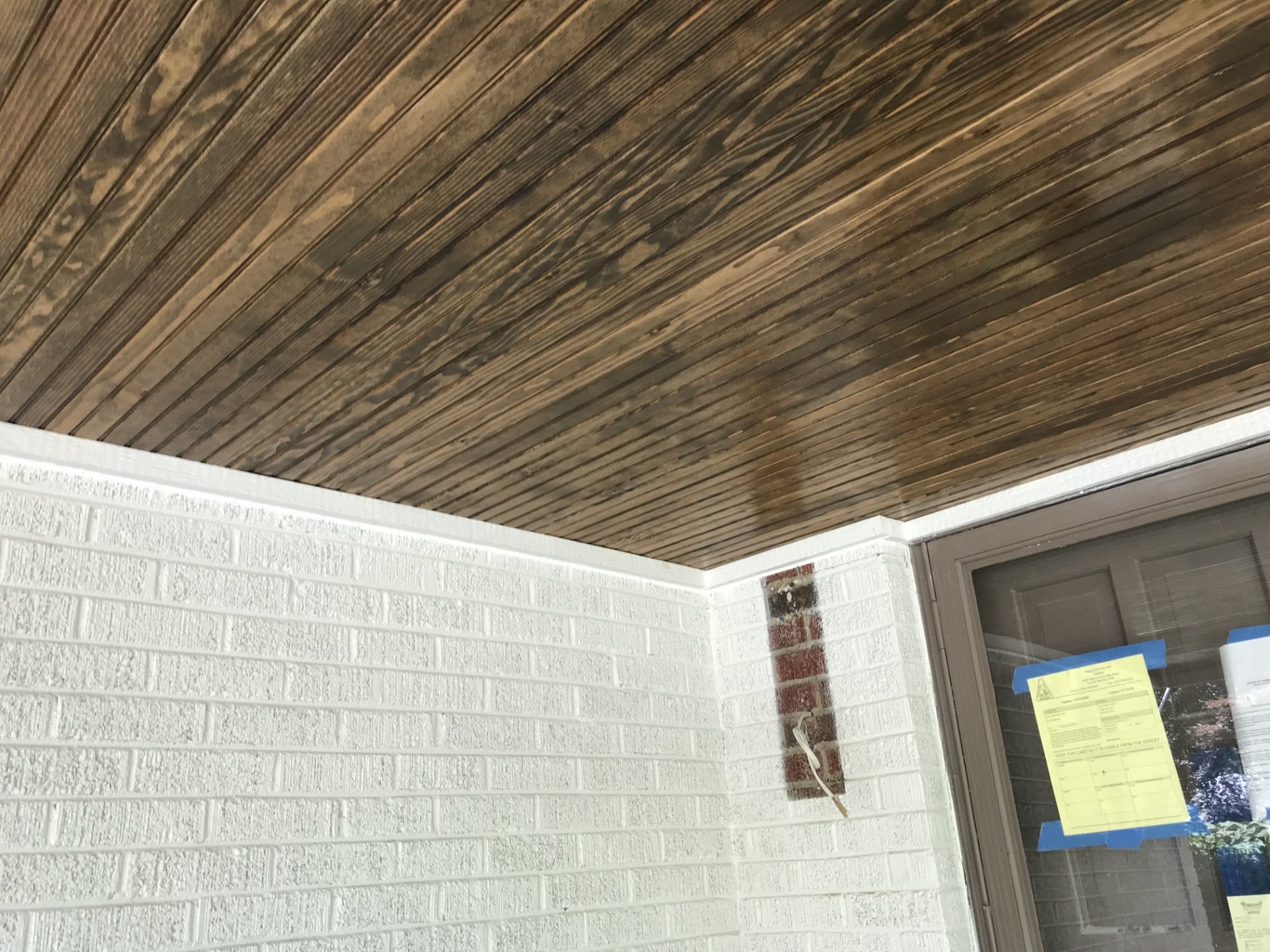 Porch Soffit : Dark Stained T&G Wood on White Painted Brick Porch by JD Contracting LLC